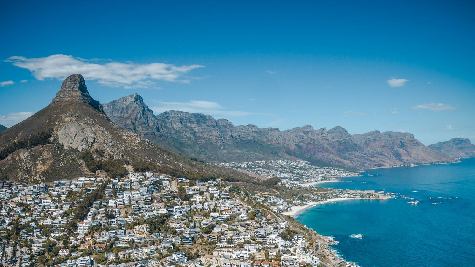 Lion's Head peak with Signal Hill and the Twelve Apostles above Camps Bay, Cape Town