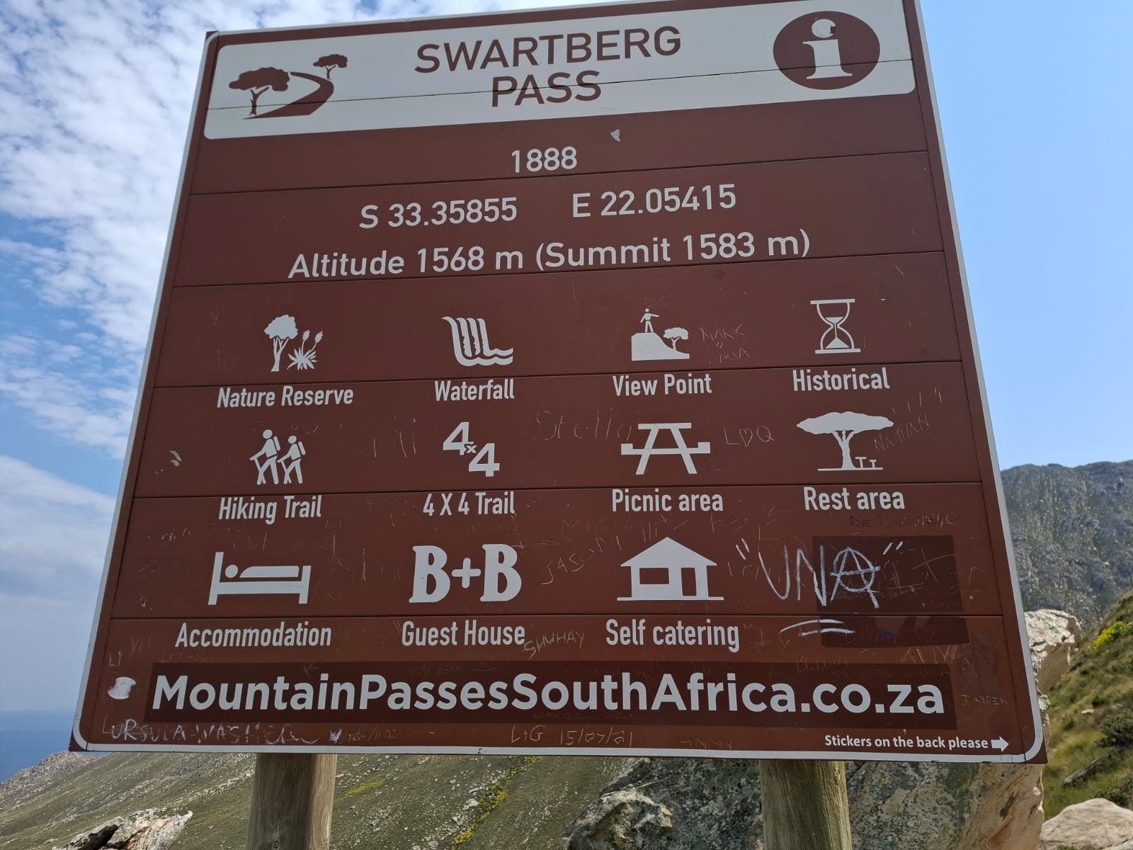 Swartberg Pass information sign showing it was built in 1888 with a summit altitude of 1583 metres